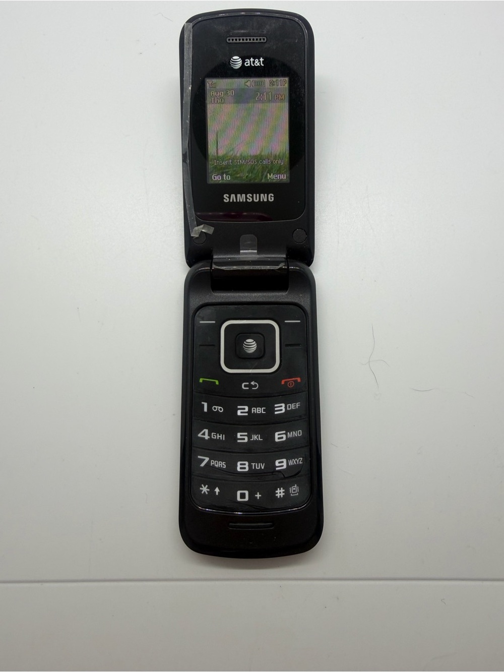 Samsung Black Flip Phone with Tactile Keypad